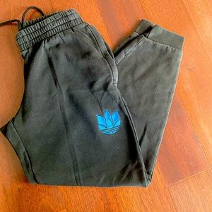 Adidas mens sweatpants black with blue trefoil. Worn but good condition!